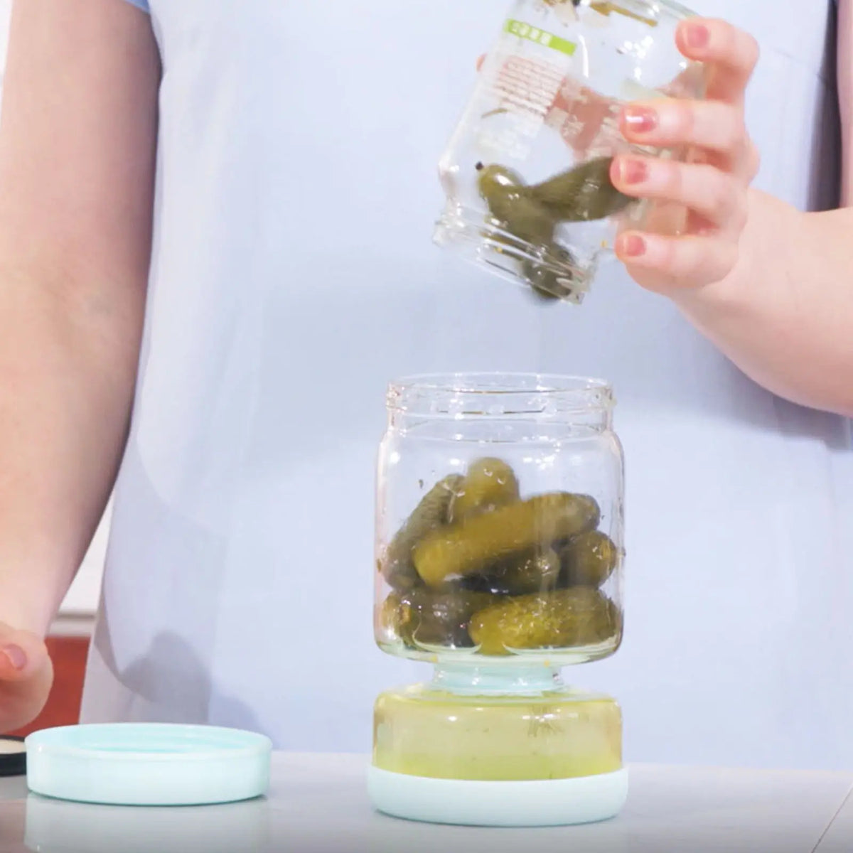 LUVAN 34Oz Glass Pickle Jar with Strainer Flip - Leakproof Airtight Kitchen Storage for Olives, Jalapenos, and Sliced Pickles - Dishwasher Safe Hourglass Design